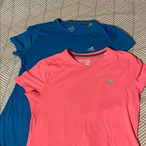 Two adidas climalite exercise shirts pink and blue